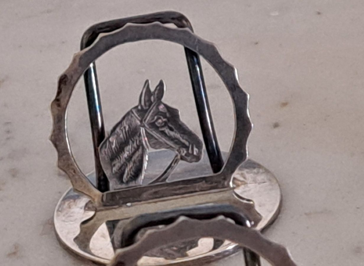 set 6 silver place holders modelled as horses heads