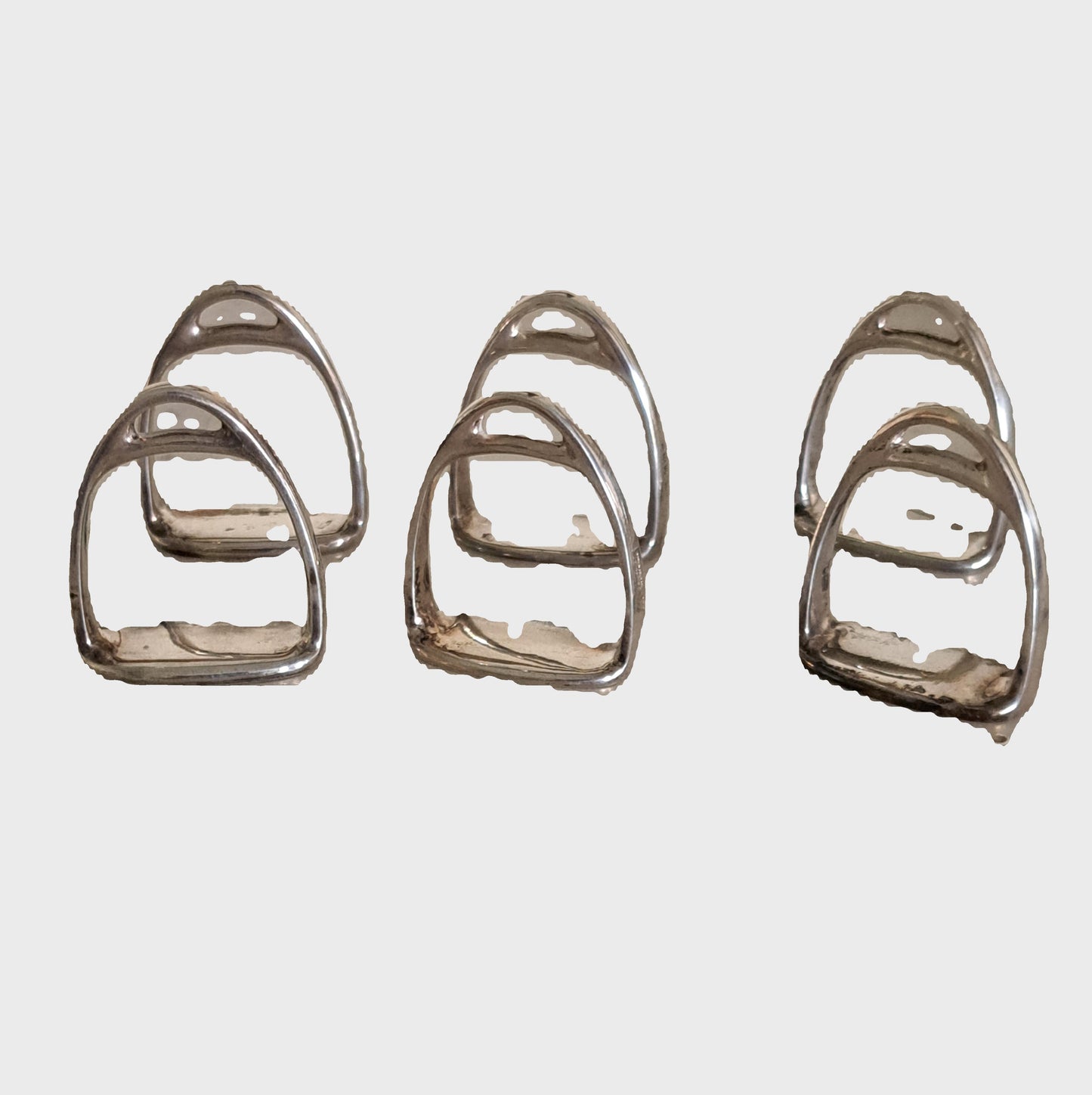 set 6 silver napkin rings modelled as stirrups