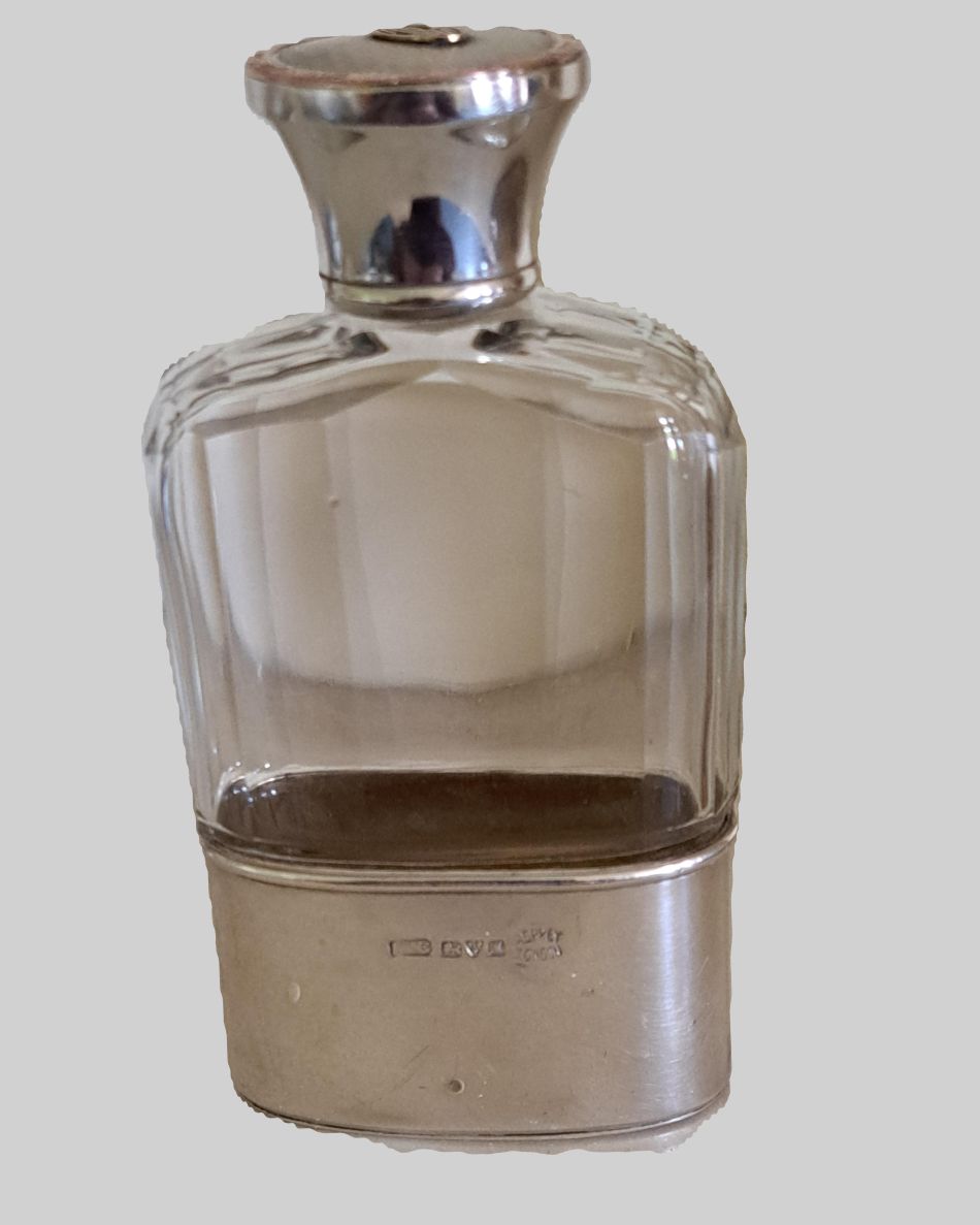 Asprey  silver and gold hip flask, Chester  1912