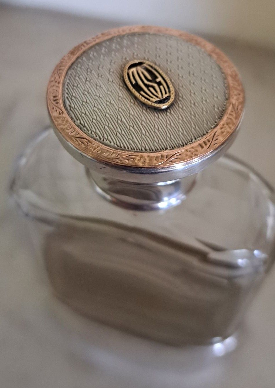 Asprey  silver and gold hip flask, Chester  1912