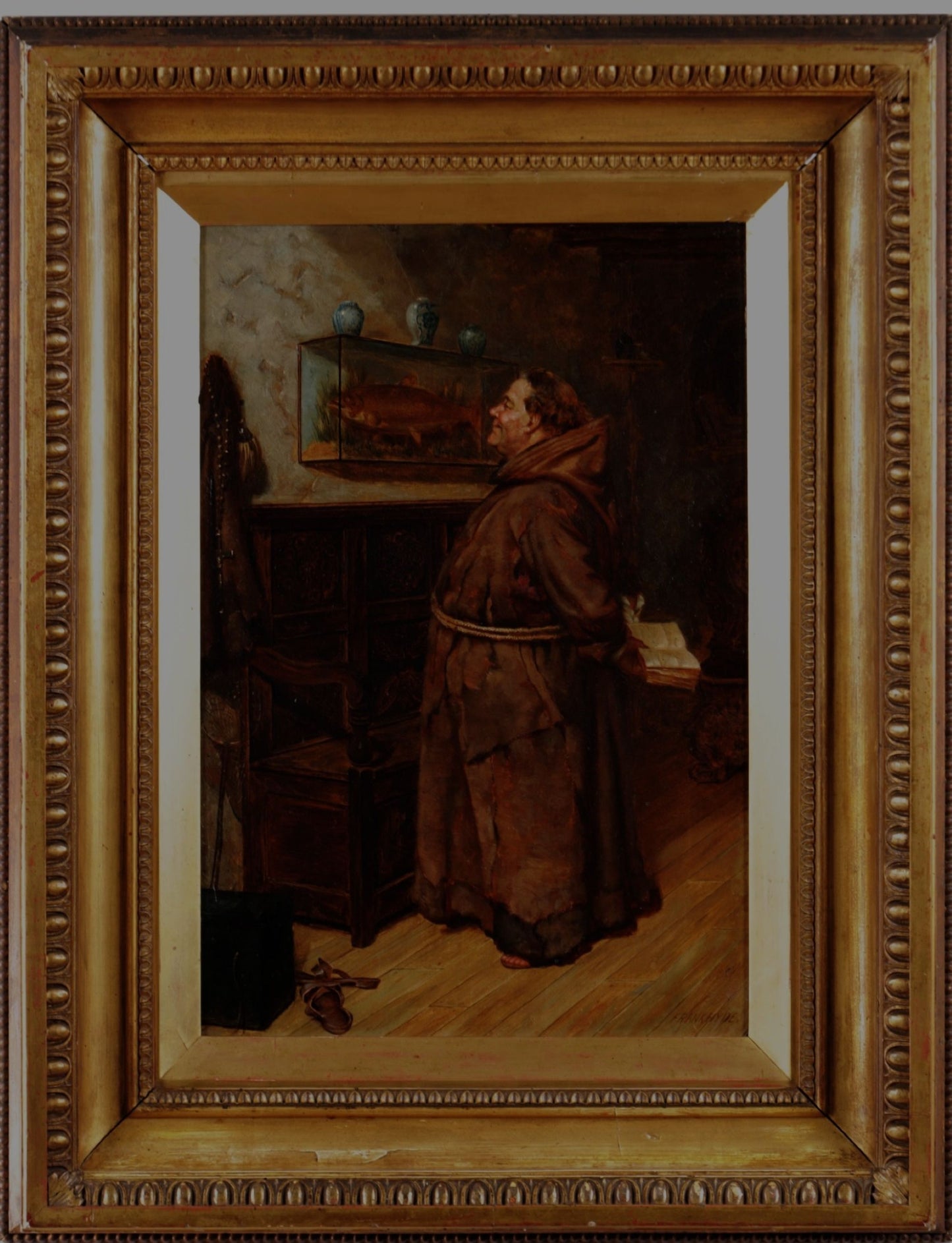 19th century oil painting of a monk admiring a fish by Frank Hyde