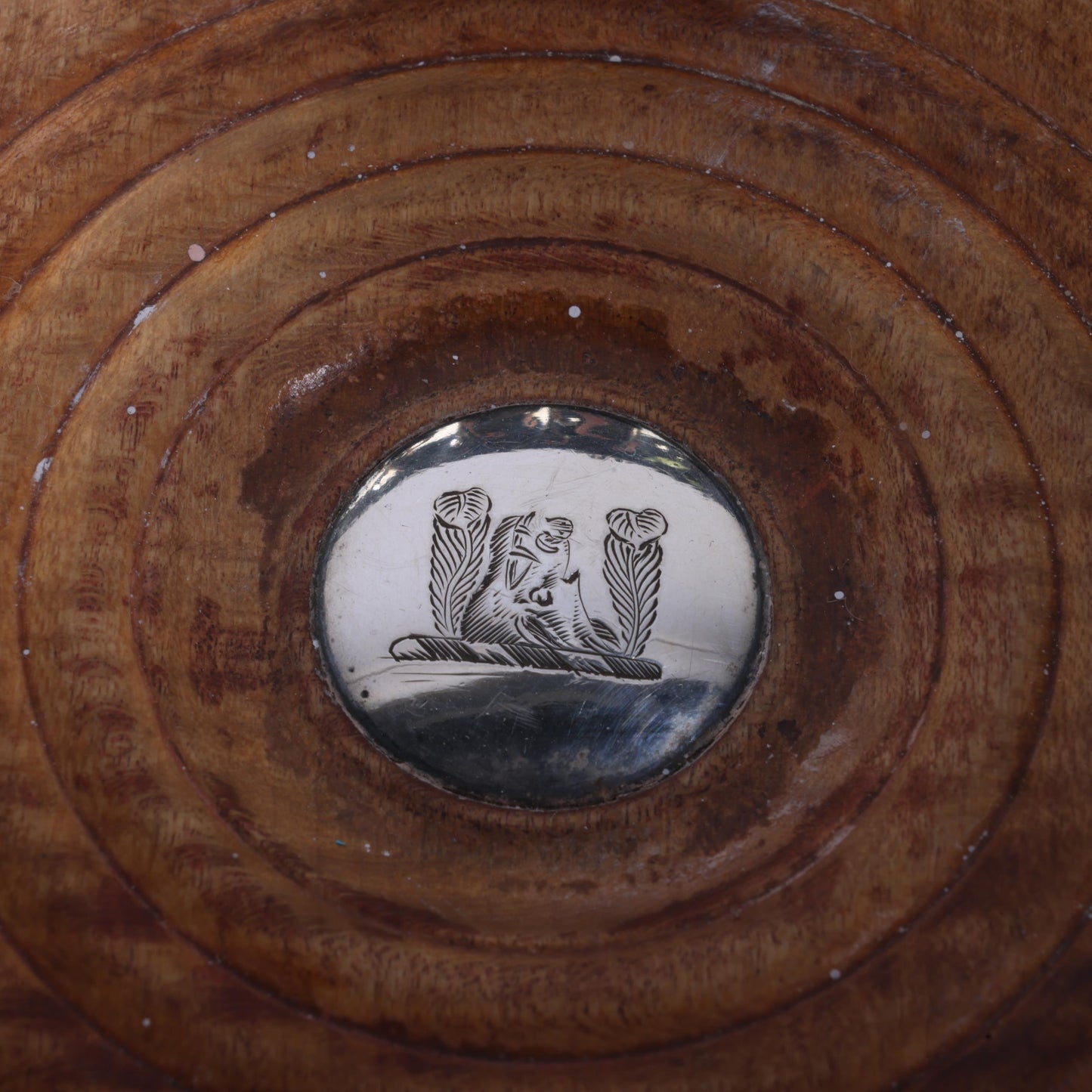 pair of Georgian silver-mounted oak wine bottle coasters